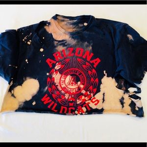 Blue destroyed UofA crop top.